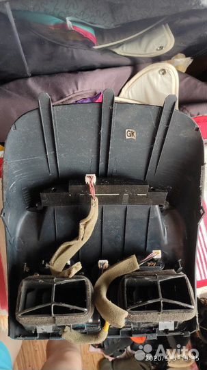 Передняя панель торпеды с часами на Ниссан Альмера