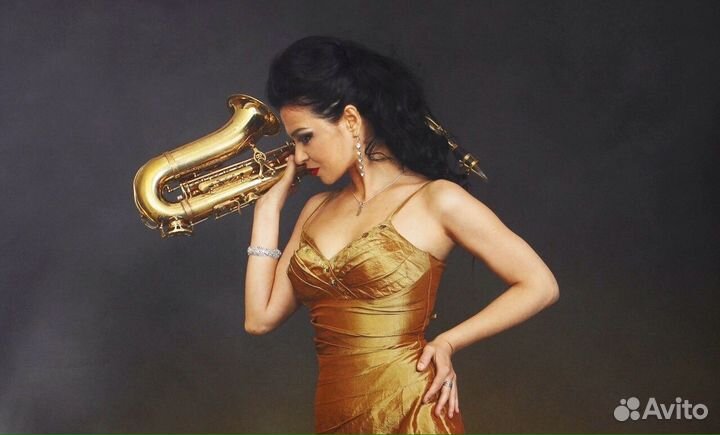 Саксофонист.Саксофонистка на праздник.Живая музыка