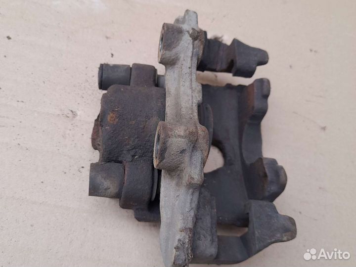 Передний левый суппорт opel astra f