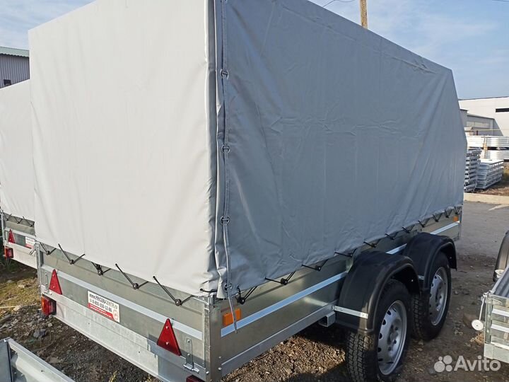 Большой двухосный прицеп легковой