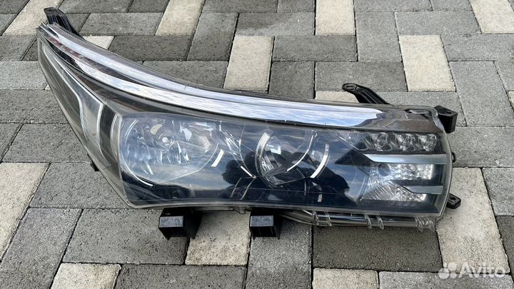 Фара toyota corolla 180