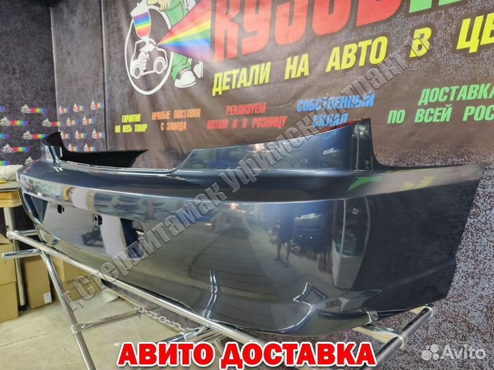 Бампер задний Kia Spectra мерцающий синий 6B NEW