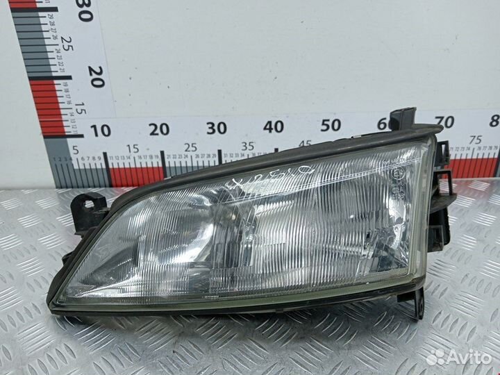 Фара передняя для Opel Vectra B 90512322