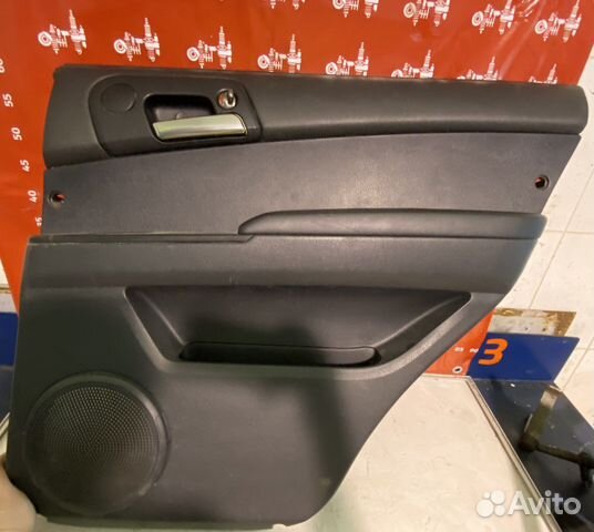 Ssang Young Kyron Обшивка задн. двери R