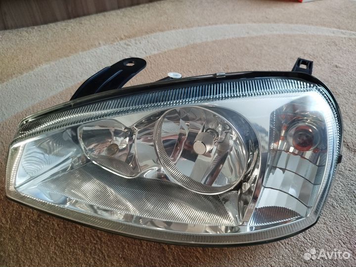 Фара передняя левая(стекло) на kalina 1
