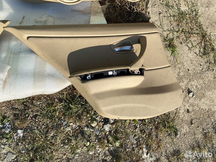 Обшивки дверей BMW E90