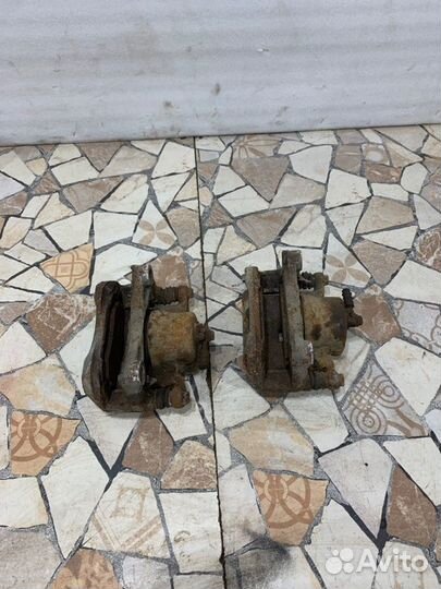 Суппорт тормозной Nissan Teana J32