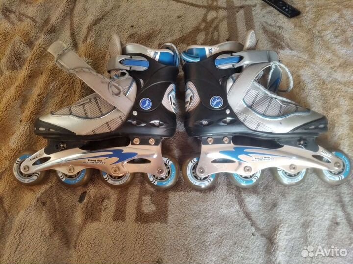 Роликовые коньки