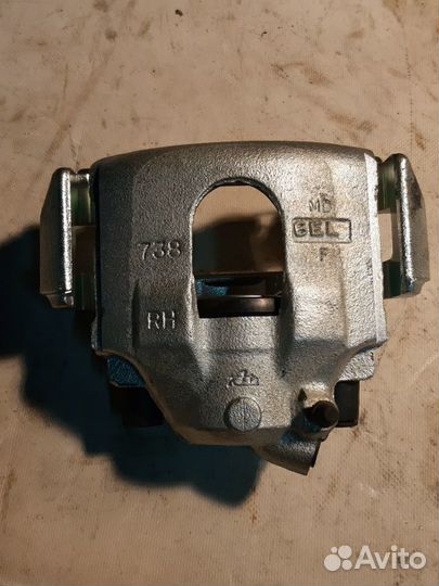 Суппорт передний правый KIA sephia