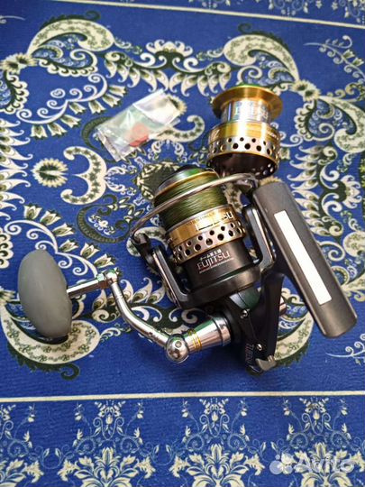 Японская катушка для спиннинга,с байтраннером