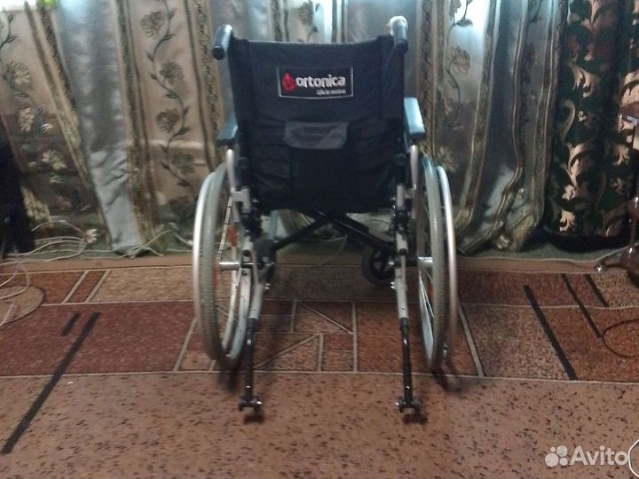 Инвалидная коляска