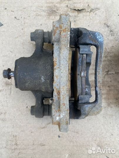 Суппорт тормозной задний Hyundai Tucson 3 TL