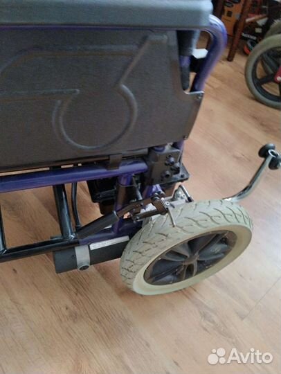 Инвалидная коляска с электроприводом