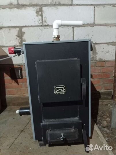 Твердотопливный отопительный котел напольный бу