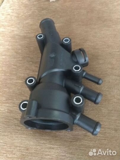 Корпус термостата на Форд фокус 1 1.6л