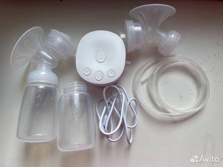 Молокоотсос электрический новый