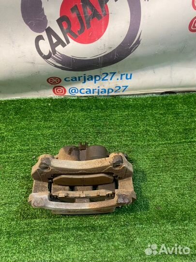 Суппорт тормозной (9) передний левый Nissan