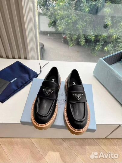 Женские лоферы Prada