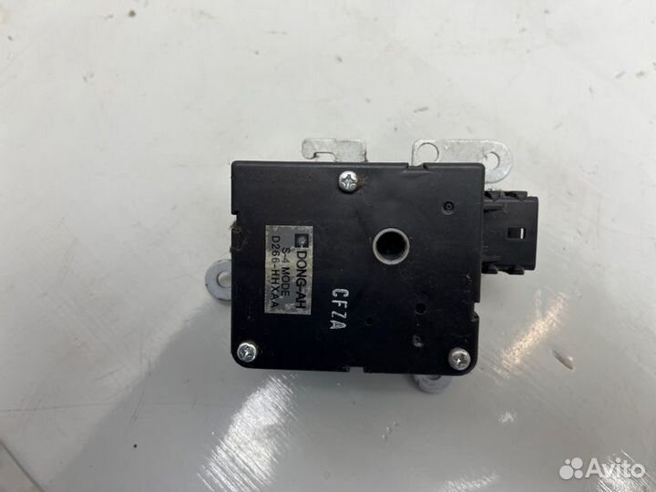 Моторчик заслонки отопителя Kia Spectra ижевский