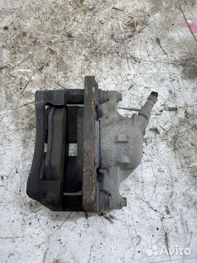 Суппорт тормозной передний левый Chery Tiggo (T11)