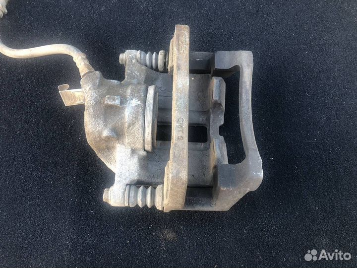 Тормозной суппорт передний правый Chery Tiggo T11