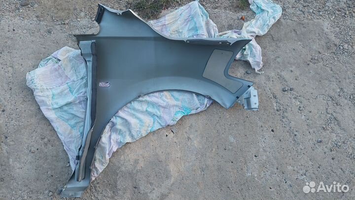 Крыло Nissan Tiida
