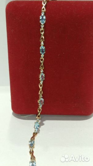 Золотой браслет с топазами