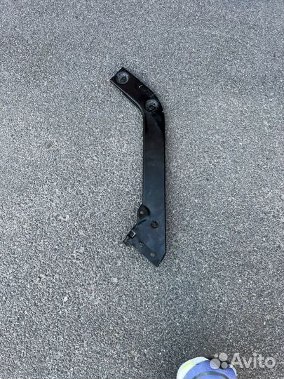 Суппорт фары тигуан 2 рест левый