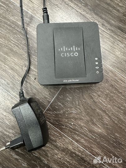 Адаптер для VoIP-телефонии Cisco SPA122