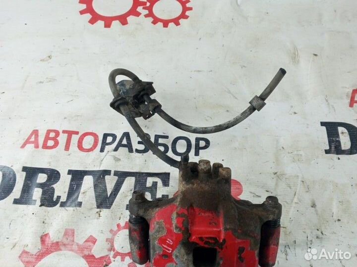 Суппорт передний правый Mitsubishi Lancer 10 седан