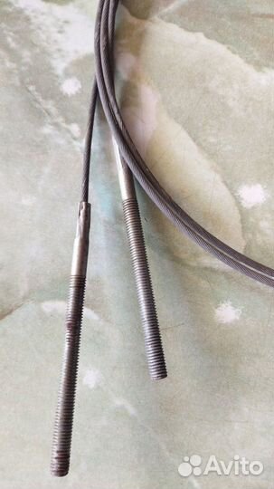 Трос ручного тормоза новый