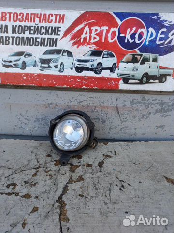 Фонарь противотуманный передний левый Ssang Yong
