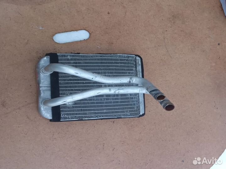 Радиатор печки kia shuma 1