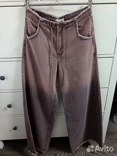 Джинсы широкие