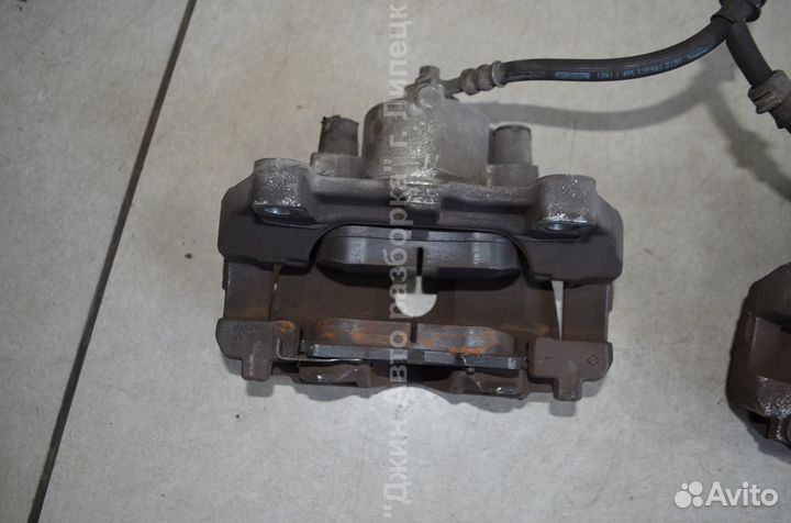 Суппорт тормозной передний Zafira B 305 мм