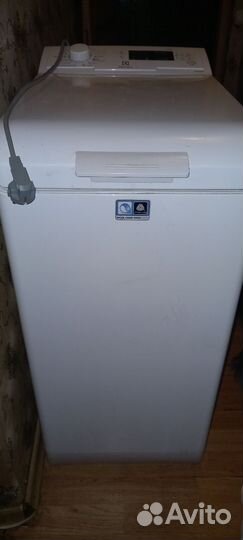 Стиральная машина с вертикальной загрузкой