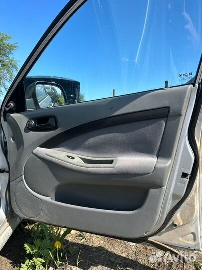 Обшивка двери Chevrolet Lacetti хетчбек F14D3 2012
