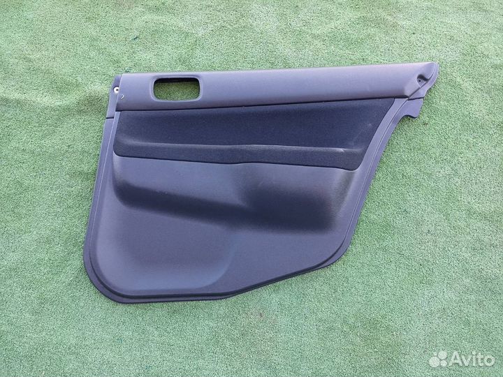 Обшивка двери задняя правая Mitsubishi Lancer 9