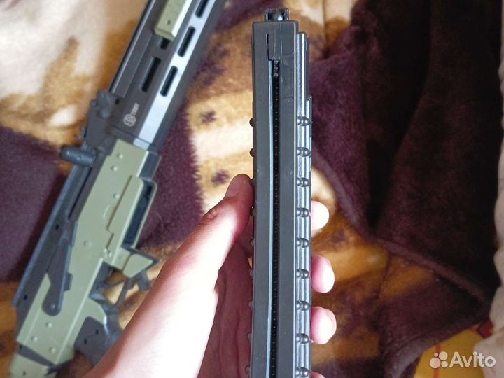 Игрушечный автомат с пульками