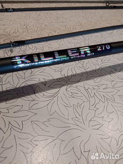 Кастинговый спиннинг с катушкой