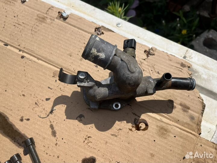 Флянец системы охлаждения на киа сид 2007