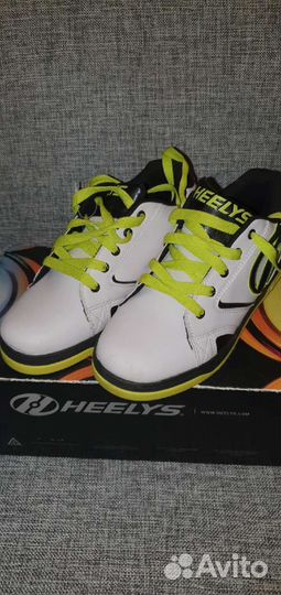 Кроссовки с роликами новые