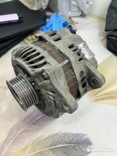 Генератор на mitsubishi lancer 10