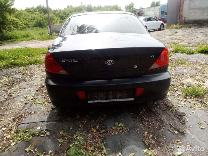 Kia spectra фонарь левый оригинал