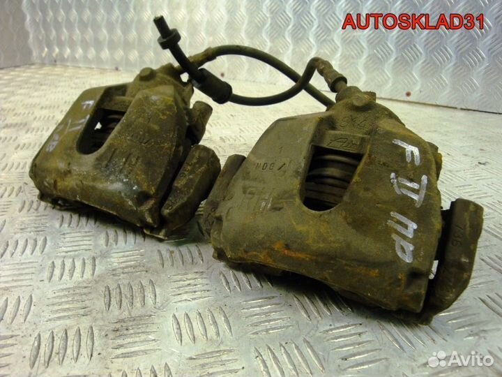 Суппорт тормозной передний Ford Focus 2