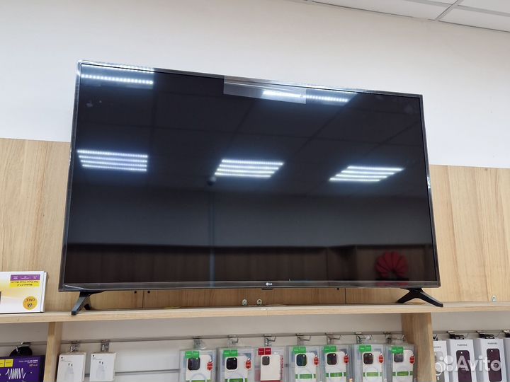 Телевизор LG 55UQ75