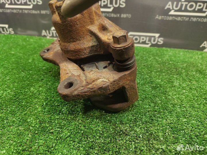 Суппорт передний правый Mitsubishi Lancer X седан