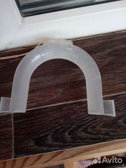 Крепление шланга слива воды стиралки