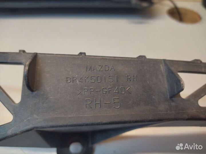 Кронштейн фары Mazda 3 BK правый