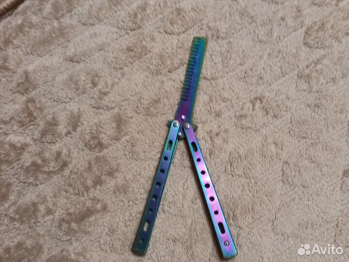 Ращоска виде нож бабачки